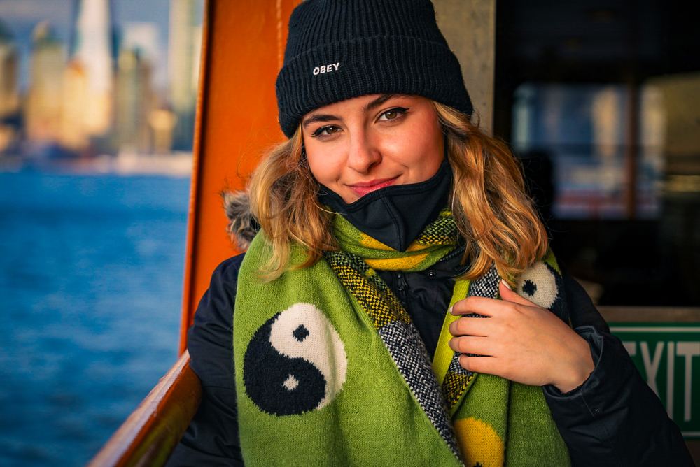 Waterfront portrait of Astrid in a beanie and scarf, portrait photography by Campbell Shepard, Frederick, MD